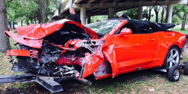 The Camaro's crumple zone apparently did its job because the driver survived without injury.
