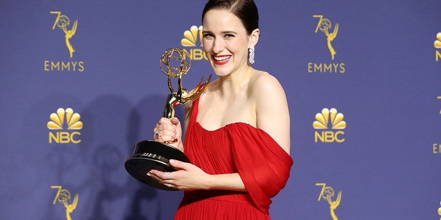 Rachel Brosnahan poses in the press room with the award for outstanding lead actress in a comedy series for "The Marvelous Mrs. Maisel."