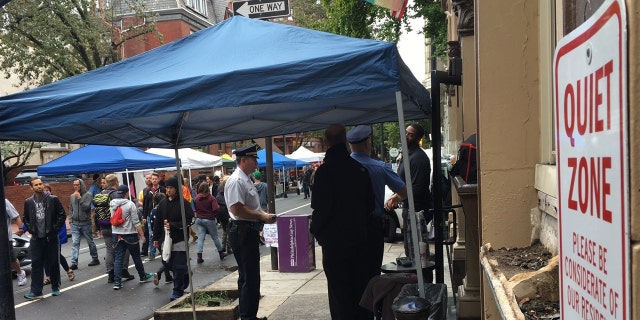 Staff and security stand outside iCandy nightclub in Philadelphia during the city's annual OutFest, Sunday, Oct. 9, 2016.