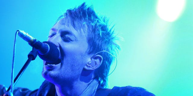 Thom Yorke, lead singer of 'Radiohead' performs at the Glastonbury
Festival, Somerset, June 28, 2003. The annual music and arts festival
attracts over one hundred thousand festival goers, with musical
highlights being REM and Radiohead playing. REUTERS/Toby Melville
TM - RTRPWNJ