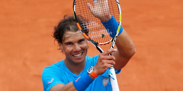 Nadal celebrates at the Roland Garros stadium, in Paris, France, Tuesday, May 26, 2015.