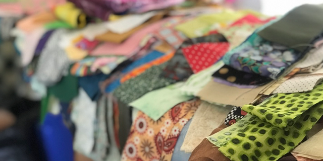 Hundreds of pieces of scrap fabric have been donated to Heft's church to be used to make quilts and dresses for children.