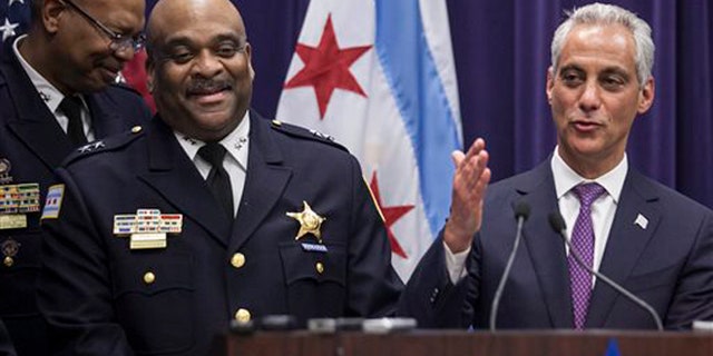 Mayor Rahm Emanuel, (r.) named Eddie Johnson, (l.) interim superintendent of the Chicago Police Department last month.