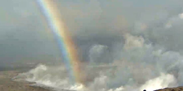 A rainbow appears on U.S. Geological Survey live stream of the Halema'uma'u Crater at Kilauea Volcano in Hawaii.