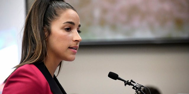 Aly Raisman filed the suit after being frustrated by what she considers is a lack of progress.