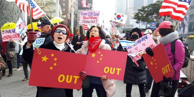 Conservative activists call for a cooling of relations with China.