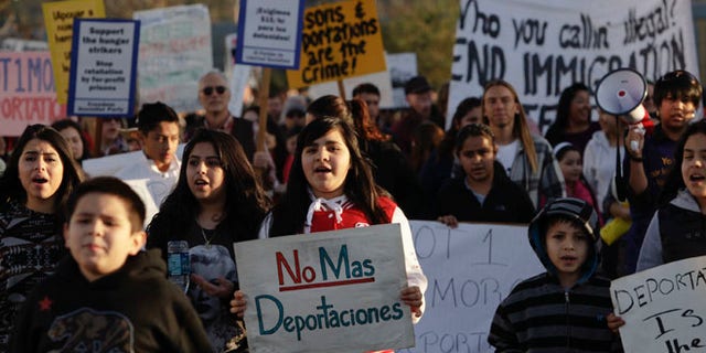 March 11, 2014: Immigrant rights supporters rally outside the Immigration and Customs Enforcement (ICE) Northwest Detention Center in Tacoma, Wash.
