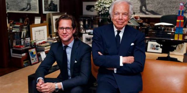 Sept. 29, 2015: Designer Ralph Lauren, right, poses in his office with Stefan Larsson, global brand president for Old Navy, in New York. Lauren is stepping down as CEO of the fashion and home decor empire that he founded nearly 50 years ago, and Larsson, who has been the global president of Old Navy for three years, will succeed him.