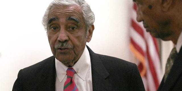 July 22, 2010: U.S. Rep. Charles Rangel speaks with Chief of Staff George Henry shortly after a congressional investigative panel accused Rangel of ethics violations. (Reuters)