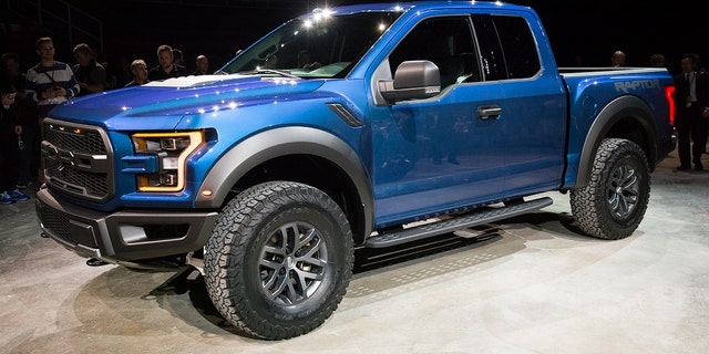 Detroit, MI, USA - January 12, 2015: Ford F150 Raptor on display during the 2015 Detroit International Auto Show at the COBO Center in downtown Detroit.