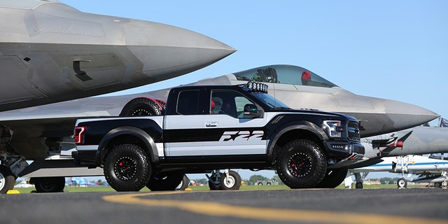 Fordâs design team worked with Ford Performance to create a one-of-a-kind F-150 Raptor â inspired by the F-22 fighter jet â for auction at Experimental Aircraft Association AirVenture Oshkosh; Ford F-22 F-150 Raptor raised $300,000 to benefit the groupâs Young Eagles