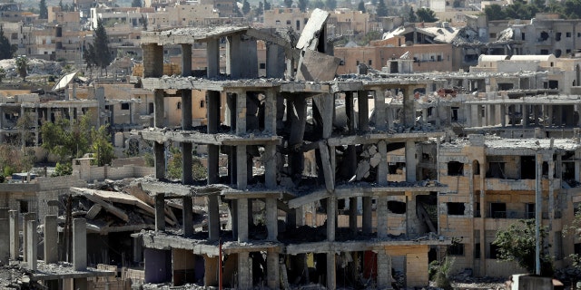 A view of destroyed buildings at the frontline in Raqqa, Syria.