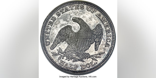 This undated provided available by Heritage Auctions shows a 1838 half-dollar minted in New Orleans in 1838 that went up for auction at the annual Florida Numismatic Convention in Tampa, Fla., this week. The coin is one of the rarest and most enigmatic coins in U.S. history. Only 10 examples are known to exist in the world. (Heritage Auctions via AP)
