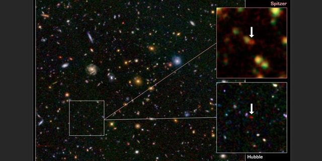 This image from the Hubble and Spitzer space telescopes shows one of the most distant galaxies known, called GN-108036, dating back to 750 million years after the Big Bang that created our universe. The galaxy's light took 12.9 billion years to reach us.