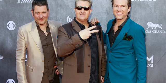 (L-R) Jay DeMarcus, Gary LeVox and Joe Don Rooney of the group Rascal Flatts brought in a cool $27 million this year.