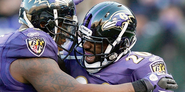 Jan. 15, 2012: Baltimore Ravens free safety Ed Reed, right, celebrates his interception with teammate outside linebacker Terrell Suggs during the second half of an NFL divisional playoff football game against the Houston Texans in Baltimore.