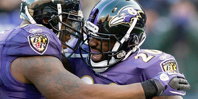 Jan. 15, 2012: Baltimore Ravens free safety Ed Reed, right, celebrates his interception with teammate outside linebacker Terrell Suggs during the second half of an NFL divisional playoff football game against the Houston Texans in Baltimore.
