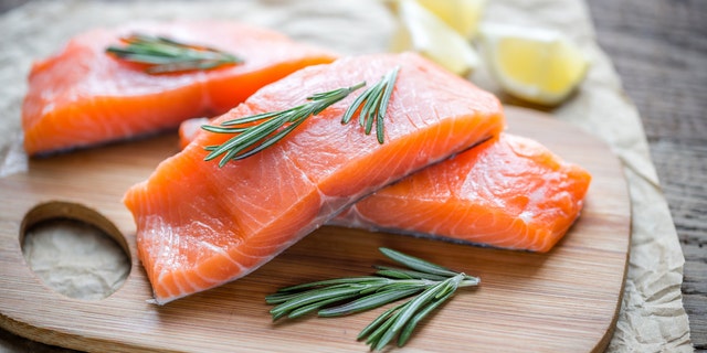 Raw salmon on the wooden board