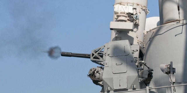File photo - The guided-missile cruiser USS Hue City conducts a live-fire test of its Phalanx close-in weapons system (CIWS). (U.S. Navy photo by Mass Communication Specialist Seaman Darien G. Kenney/Released)