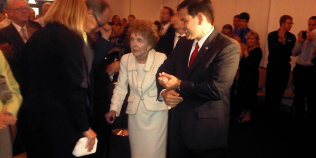 Tuesday: Florida Sen. Marco Rubio escorts former first lady Nancy Reagan to her seat after helping to prevent her from stumbling as they entered the room for a speech Rubio was delivering at the Reagan Presidential Library in Simi Valley, Calif.