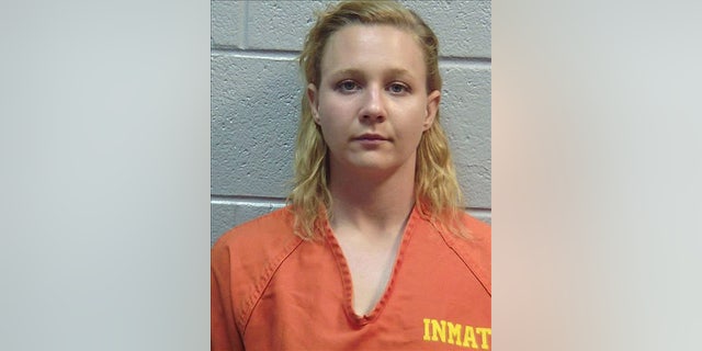 This June 2017 photo released by the Lincoln County (Ga.) Sheriff's Office, shows Reality Winner. Winner, is being held for federal authorities at the Lincoln County, Ga., jail. Winner charged with leaking U.S. government secrets to a reporter poses no flight risk if she's released from pre-trial confinement, her parents said Wednesday, June 7, 2017, though they fear prosecutors will seek to use the case to send a tough message from the Trump administration. (Lincoln County (Ga.) Sheriff's Office via AP)