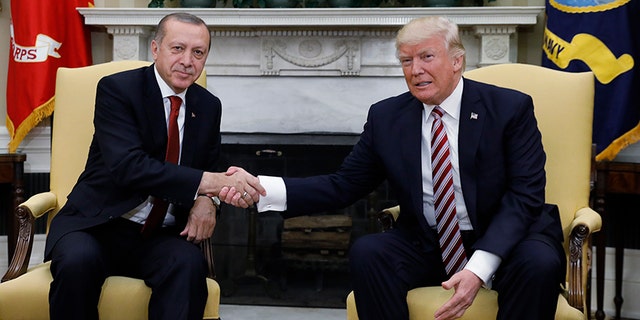 Turkey's President Recep Tayyip Erdogan with U.S President Donald Trump in the Oval Office of the White House, May 16, 2017.