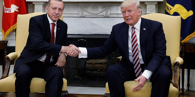 Turkey's President Recep Tayyip Erdogan with U.S President Donald Trump in the Oval Office of the White House, May 16, 2017.