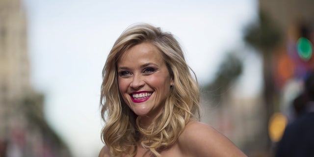 April 30, 2015. Reese Witherspoon poses at the premiere of "Hot Pursuit" in Hollywood.
