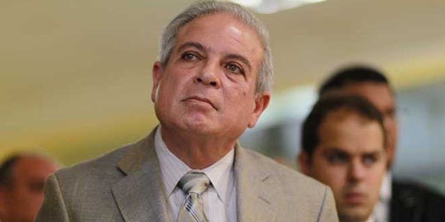 MIAMI - AUGUST 10: City of Miami Mayor Tomas Regalado listens as police Chief Miguel A. Exposito speaks during a press conference to announce "Operation Take Back Our Streets"' on August 10, 2010 in Miami, Florida. The Miami Police Department launched the operation in response to recent shootings in the Model City and Little Haiti communities of Miami. The city has seen a number of shootings recently using high powered assault weapons. (Photo by Joe Raedle/Getty Images)