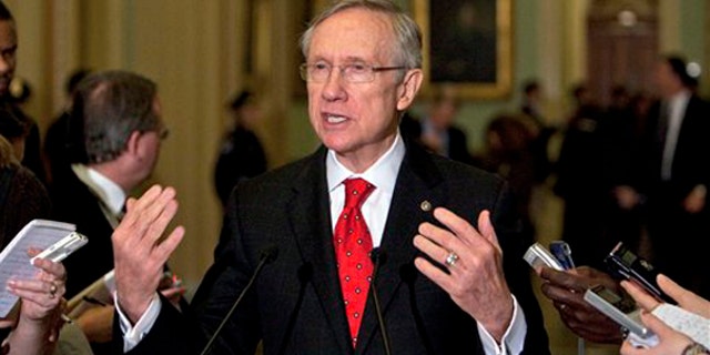 Senate Majority Leader Harry Reid talks to reporters in Washington Dec. 6. (AP Photo)