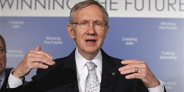 Senate Majority Leader Harry Reid gestures during a news conference on Capitol Hill Feb. 16.