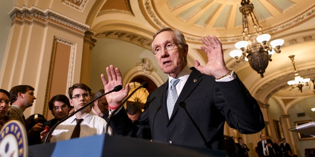 Sept. 24, 2013: Senate Majority Leader Harry Reid talks to reporters just off the Senate floor in Washington.