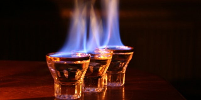 A flaming shot has severely injured a bar patron.