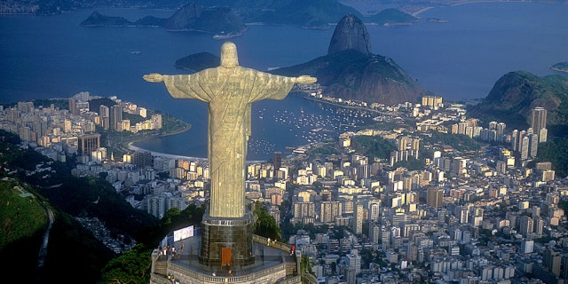 Christ, symbol of Rio de Janeiro, standing on top of Corcovado Hill, overlooking Guanabara Bay, Rio de Janeiro, Brazil