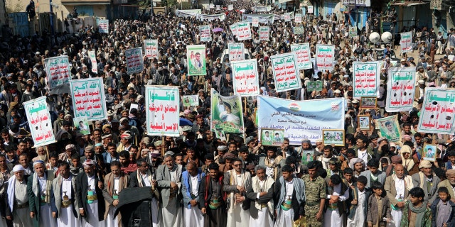 Followers of the Houthi movement rally to mark the 'Martyr Day' in Saada, Yemen February 5, 2018. The placards read: "Allah is the greatest. Death to America, death to Israel, a curse on the Jews, victory to Islam." REUTERS/Naif Rahma - RC19C29CE220