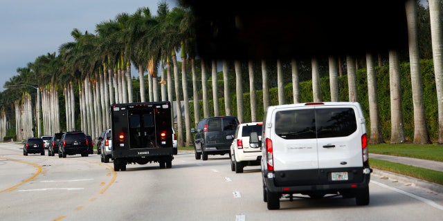 President Trump's motorcade arrives at the Trump International Golf Club in West Palm Beach, Fla. Saturday afternoon.
