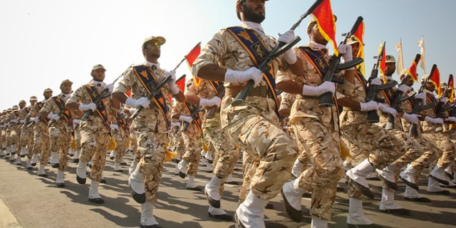 FILE 2011: Members of the Iranian revolutionary guard march during a parade to commemorate the anniversary of the Iran-Iraq war.