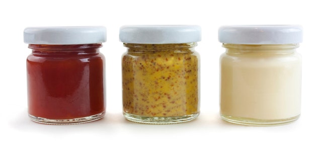 Jars of sauces including mustard, mayo and tomato sauce