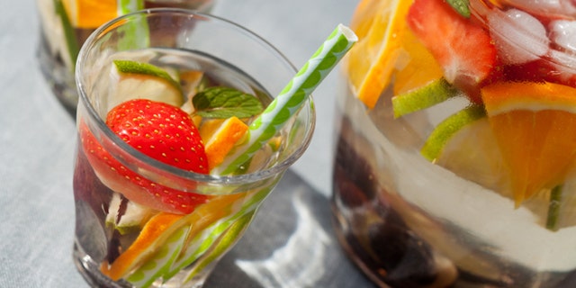 Refreshing white sangria (punch) with fruits, picnic idea