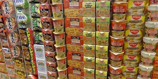 This Oct. 17, 2014 photo provided by Linda Lombardi shows a variety of instant ramen soup packages on display at the Cup Noodle Museum in Yokohama, Japan. The museum honors the inventor of instant ramen with exhibits about the history and varieties of the soup. (AP Photo/Linda Lombardi)