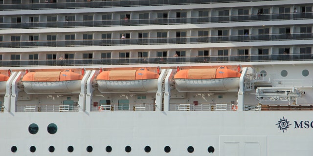 Velsen, the Netherlands, July 7th, 2014 : MSC Magnifica on North Sea Canal from Amsterdam towards the Ijmuiden locks, The Magnifica is operated by MSC since 2010 and 293.8 metres (964 ft) long.