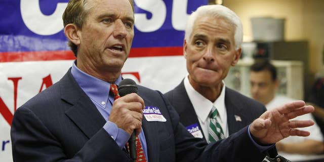 Robert F. Kennedy Jr., left, gestures as he speaks during a news conference as he endorses Gov. Charlie Crist, right, in Crist's independent candidacy for the Senate, Wednesday, Oct. 13, 2010 at Shelby's Kitchen & Deli in Deerfield Beach, Fla. (AP Photo/Wilfredo Lee)