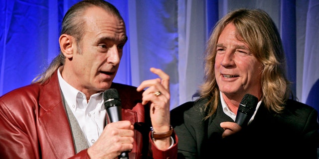 Status Quo members Francis Rossi (left) and Rick Parfitt. Parfitt has died at age 68.