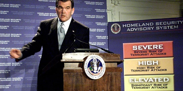 March 12, 2002: Then-Homeland Security Director Tom Ridge discusses a color-coded terror alert system in Washington. (AP Photo)