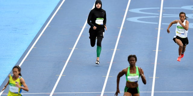 Aug. 12, 2016: Saudi Arabia's Kariman Abuljadayel competes in a women's 100-meter heat during the athletics competitions of the 2016 Summer Olympics at the Olympic stadium in Rio de Janeiro, Brazil.