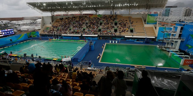 In this Aug. 10, 2016 file photo, the water of the diving pool at right appears a murky green.