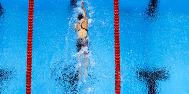 Ledecky almost laps the field, breaks own world record in 800-meter ...