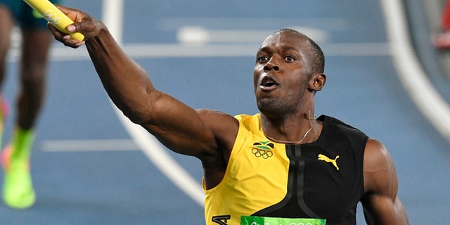 Jamaica's Usain Bolt celebrates winning the gold medal in the men's 4x100-meter relay final during the athletics competitions of the 2016 Summer Olympics at the Olympic stadium in Rio de Janeiro, Brazil, Friday, Aug. 19, 2016.