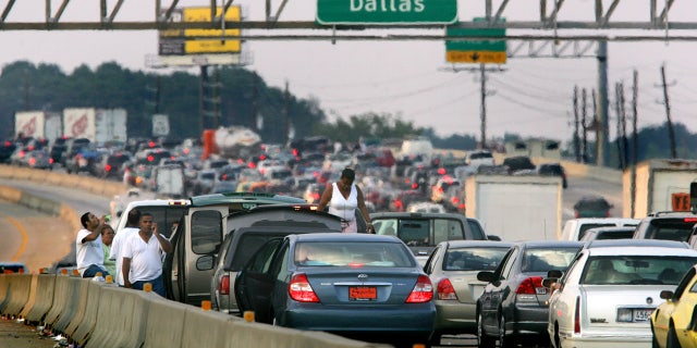 Thousands of cars try to evacuate to Dallas in advance of Hurricane Rita in north Houston September 22, 2005.