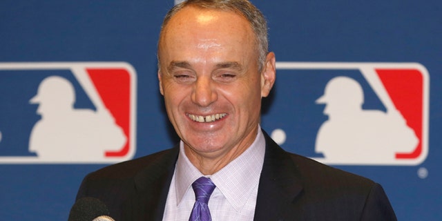 Nov. 14, 2013: Major League Baseball Chief Operating Officer Rob Manfred talks to the media following baseball's general managers' meetings in Orlando, Fla.